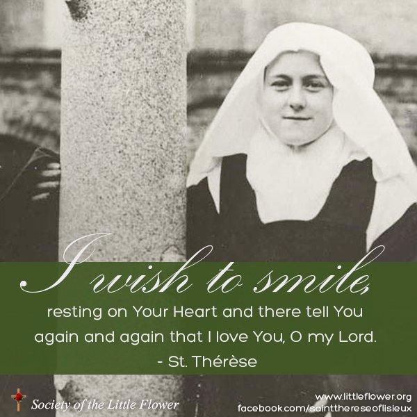 Photo of St. Therese of Lisieux as a novice, embracing the large crucifix in the courtyard at Le Carmel monastery.