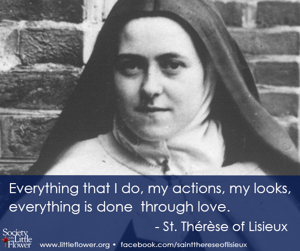 Photo detail of St. Therese of Lisieux standing near the brick wall in the courtyard at Le Carmel, Lisieux France.
