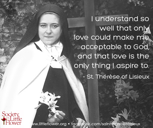 Photo of St. Therese of Lisieux, holding an Easter lily, in the garden at Le Carmel monastery, before a wooden cross.
