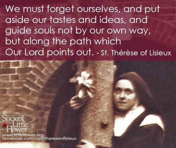 Photo detail of St. Therese of Lisieux, embracing the large crucifix in the courtyard at Le Carmel monastery.