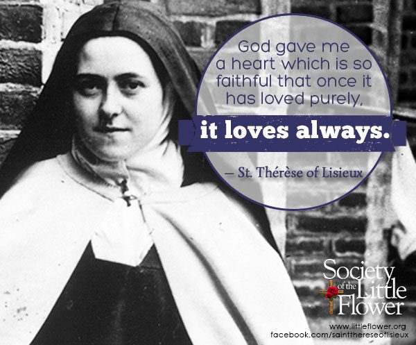 Photo detail of St. Therese of Lisieux standing near the brick wall in the courtyard at Le Carmel, Lisieux France.