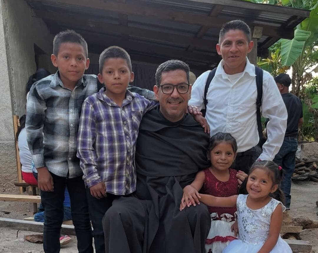 Carmelite Brother Pedro with family in Honduras